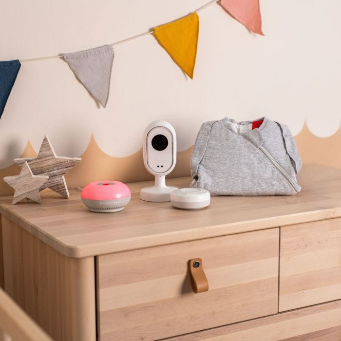 Product imagery of contents of sweet dreams bundle in a home setting