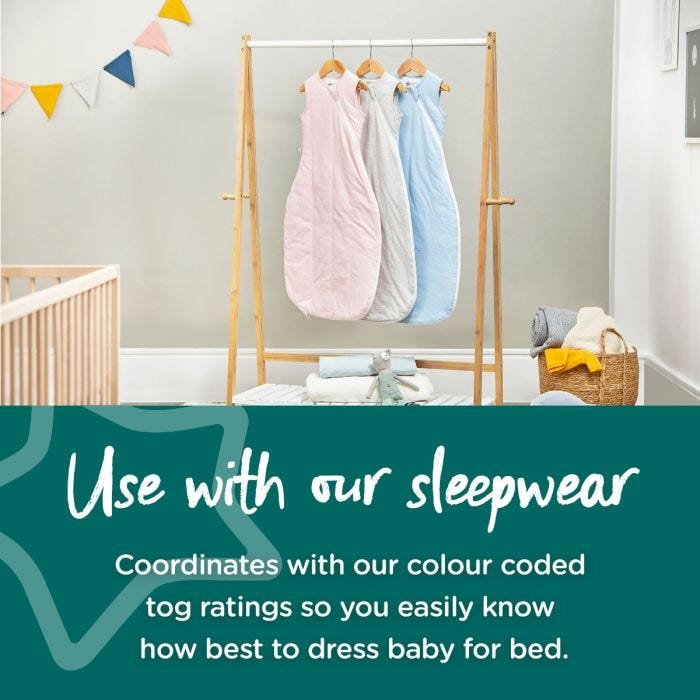 Sleepbags hanging on wooden rail with text explaining you can use the groegg and sleepwear together