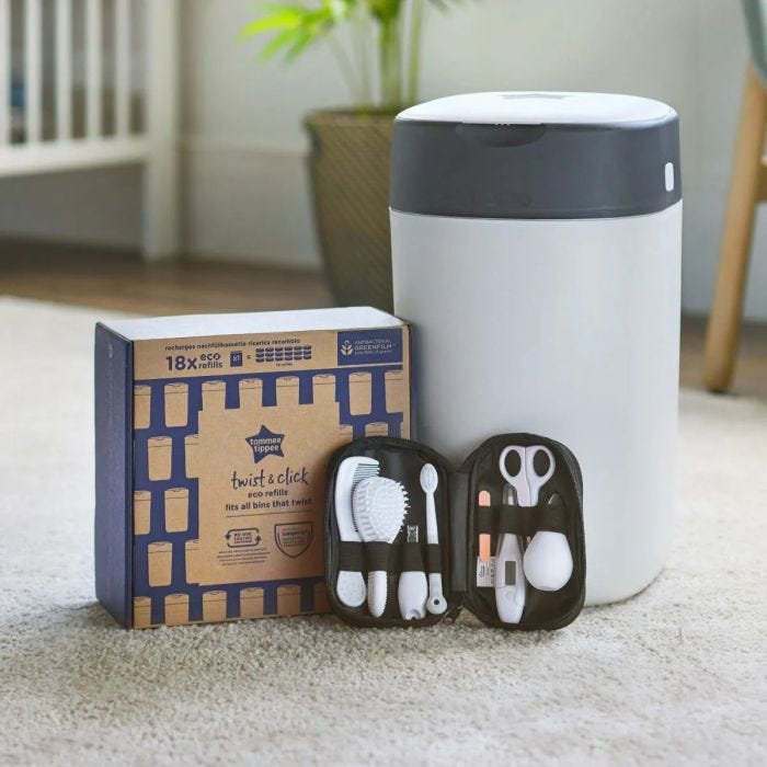 Products included in the ultimate nappy disposal bundle. Including bin, 18 pack of eco refills and healthcare kit in home setting.