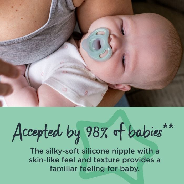 Baby with green ultra-light pacifier in mouth with text stating these pacifiers are accepted by 98% of babies.