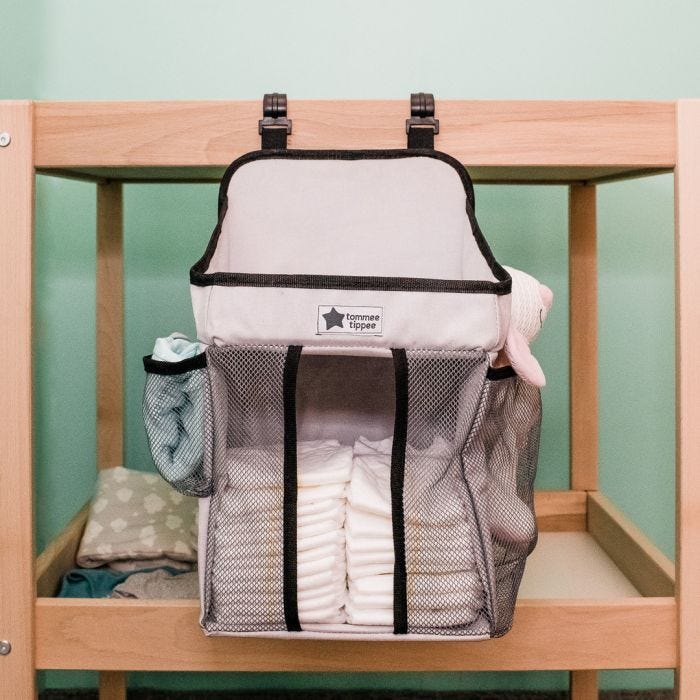 Nappy Change Caddy hanging on side of changetable