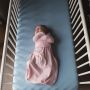 Baby sleeping in Pink Marl Swaddle Wrap
