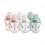 6 Closer to Nature baby bottles in pink, green and white on a white background