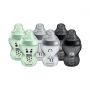 6 Closer to Nature baby bottles in black, green and silver on a white background