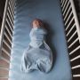 Baby wearing Blue Marl Swaddle Wrap