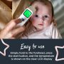 EASY TO USE Hand holding thermometer to baby’s head with screen illuminated green showing 36.3 degrees.