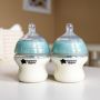 2x Closer to Nature Advanced Anti-Colic baby bottles on a white table.