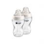 2x 340ml Closer to Nature baby bottles with cream screwrings on a white background.