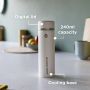 Cooling flask on a kitchen counter with pointers to its digital lid, 240ml capacity and cool base