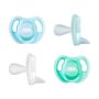 4 sucettes sous différents angles sur fond blanc