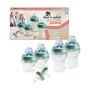 Silicone Bottle and Breast-like Pacifier Set next to packaging on white background.