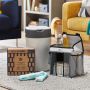 Products included in the ultimate nappy disposal bundle. Including bin, 18 pack of eco refills and change caddy in home setting.