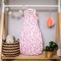 The Original Grobag Botanical Sleepbag hanging on rail in nursery