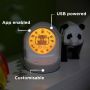 Connected sleep trainer clock with pointers saying it’s app enabled, USB powered and customisable
