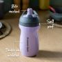 Purple sportee bottle on a kitchen table with pointers to its bite resistant spout, insulated base and spill proof lid