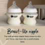 Close up of 2 5oz Closer to Nature baby bottles with text explaining the benefits of the breast-like nipple.