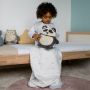 Child in All-Season Grobag holding Grofriend Light & Sound Sleep Aid