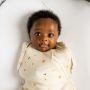 baby being swaddled in The Original Grobag Swaddlebag