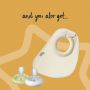Image of additional contents including 2 breast like soothers and 1 milk feeding bib
