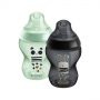 1x green Pip and 1x black Ollie Closer to Nature baby bottle on a white background.