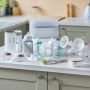 Imagery of products included in the complete breastfeeding bundle in home setting