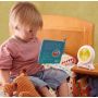 Child reading story book with Groclocl
