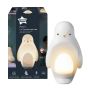 Penguin nightlight next to packaging on a white background