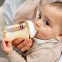 Baby drinking from a PPSU baby bottle.