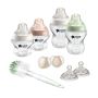 Newborn Baby Bottle Starter Set with 4x bottles, bottle brush, 2x soothers, 2x breast-like teats on a white background.