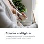 Mum using the silicone breast pump with text about how it’s smaller and lighter