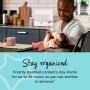 Dad feeding baby in kitchen with white steam sterilizer in the background and text about staying organized