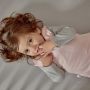 Child wearing The Original Grobag Pink Marl Sleepbag