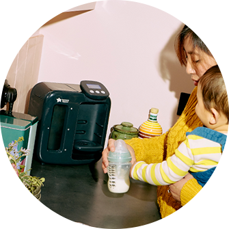 a baby with a tommee tippee ultra-light soother in his mouth