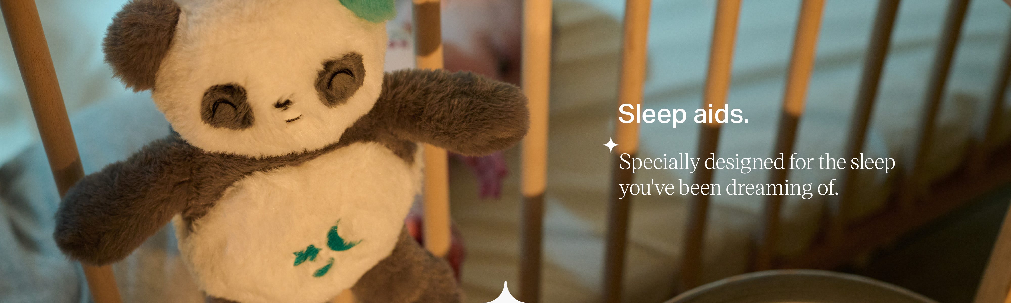 Tommee Tippee panda sleep companion in use. Text reads “Sleep aids. Specially designed for the sleep you’ve been dreaming of”. 