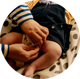 A baby wearing a tommee tippee Sleepwear 