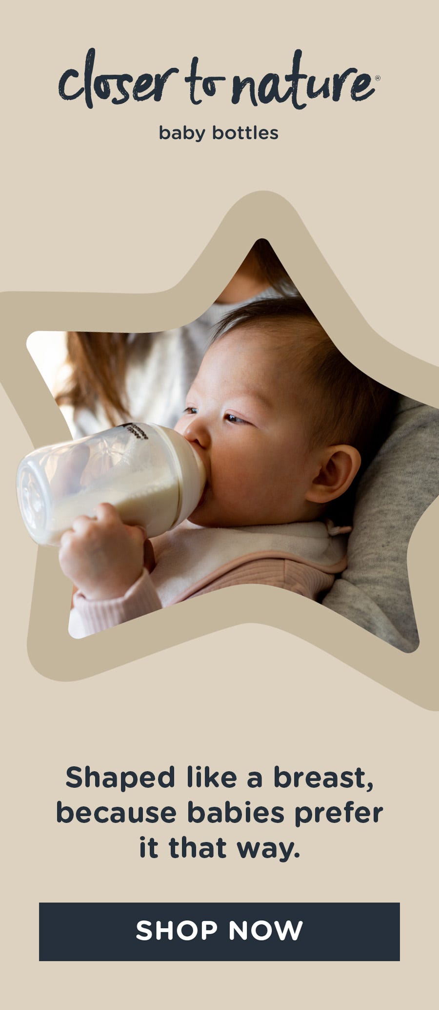 baby using a tommee tippee bottle